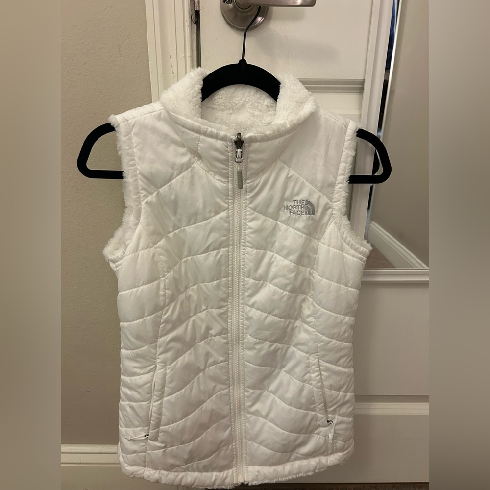 The North Face 
White reversible puffer vest